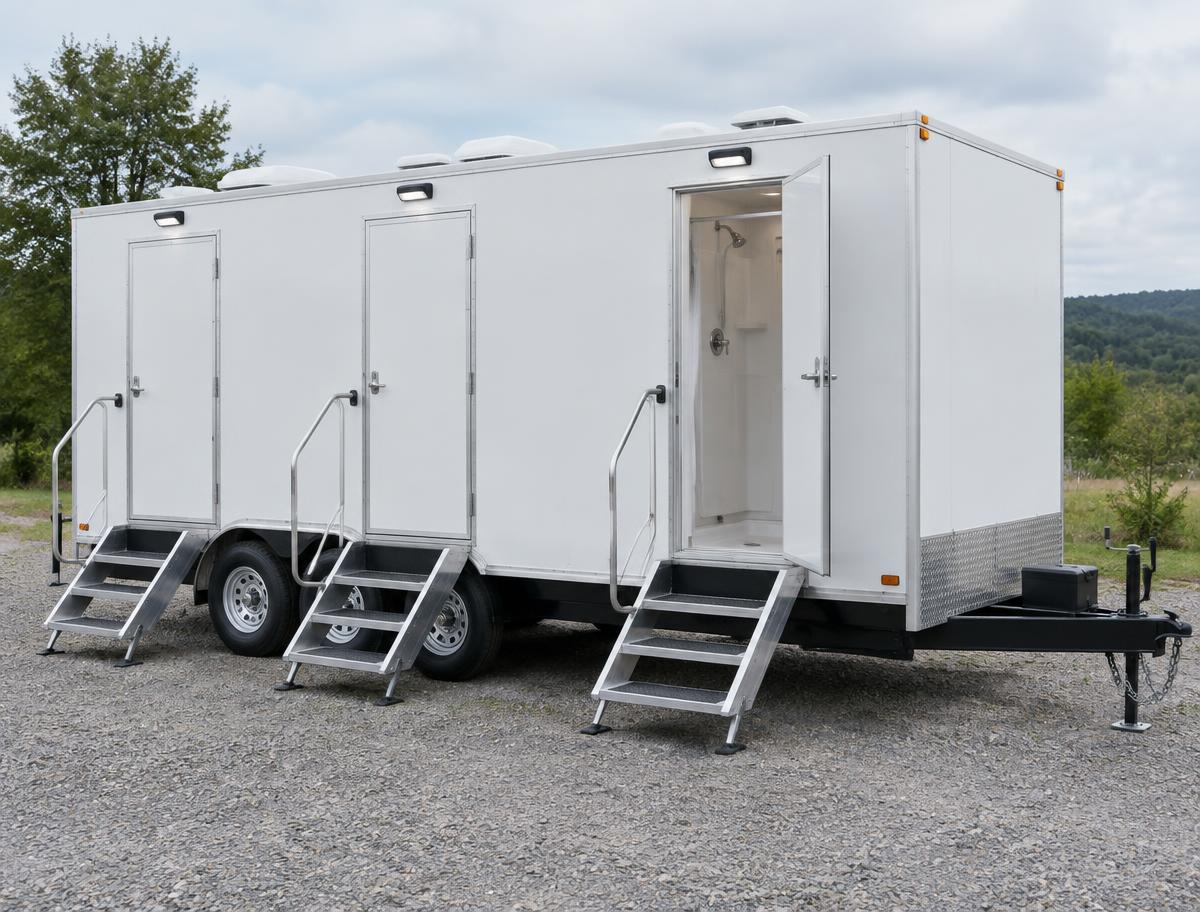 Portable shower trailer with separate shower room entrances